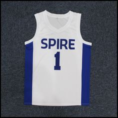 a white and blue basketball jersey with the number 1 on it that says spire