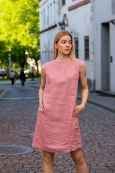 Light rose linen summer dress. Washed and soft linen dress.  Looks perfect on every woman!  This dress is made of 100% washed, natural Baltic linen (EU) GIFT - FREE SHIPPING WORLDWIDE * ENLI5 Linen - it's our family creation... for you with love... _ DESCRIPTION  - made from 100% Baltic linen - dress has two comfortable pockets  - model height is 5.7ft (174 cm.) she wears size M - handmade by ENLI5 Linen family in Lithuania (EU) - Color may vary due to different displays * WHY TO CHOOSE US? Every dress is made individually for our clients. If you need small changes in size, please write us a message and together we would find the solution. Our linen is twice washed, so it gets better shape, stylish wrinkles and  indescribable tenderness.  Do not forget that if you really want our products, Summer Linen A-line Sleeveless Dress, Sleeveless Linen Dress In Flax Color, Flax Sleeveless Linen Dress, Sleeveless Flax Linen Dress, Summer Linen A-line Dress, Linen A-line Sleeveless Sundress, Linen Sleeveless Sundress, Sleeveless Flax Beach Dress, Pink Sleeveless Linen Dress