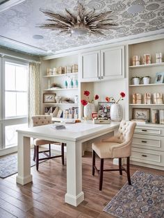 a white table and chairs in a room