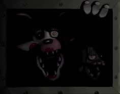 two creepy looking clowns with their mouths open and eyes wide open in the dark