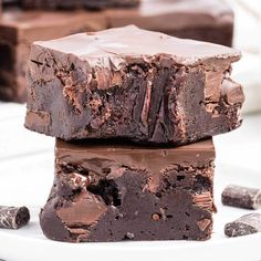 two pieces of chocolate brownie stacked on top of each other