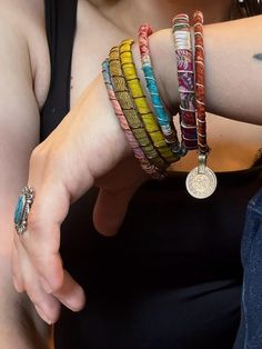 Stack up on these colorful & bold boho bangles!  I wrap each bracelet by hand with unique upcycled sari silk and finish with a wire wrap to secure.  Add vintage kuchi coin charms to a few or all to complete the look, These bracelets are a super simple and lightweight for easy, comfortable wear. Select one or mix and match to create your own personalized set! ★ Handmade ★ Upcycled Sari Silk ★ Non-Tarnish Wire ★ Vintage Kuchi Coin Charm ★ 65mm inner diameter ✉ Message for Custom Requests ✈ Free Sh Multicolor Bohemian Beaded Bracelets For Festivals, Bohemian Multicolor Beaded Bracelets For Festivals, Spiritual Hand Wrapped Wrap Bracelet For Festival, Multicolor Bohemian Bracelets For Festivals, Bohemian Multicolor Bracelets For Festivals, Bohemian Bangle Friendship Bracelets, Multicolor Bohemian Bracelet For Festivals, Hand Wrapped Wrap Bracelet Bangle For Friendship, Hand Wrapped Bangle Wrap Bracelet For Friendship