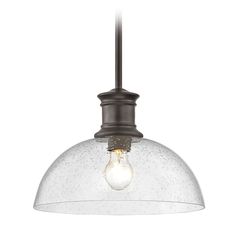 an image of a light fixture that is hanging from the ceiling and has a clear glass dome