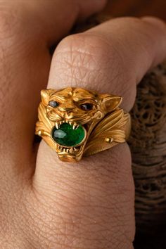 Our Jaguar Ring cast in solid 18K gold adorned with crystal eyes and an emerald in its jaws. Mens Gold Signet Rings, Golden Jaguar, Wearing Rings, Mens Diamond Ring, Stone Rings For Men, Stone Ring Design, Mens Ring Designs, Man Jewelry