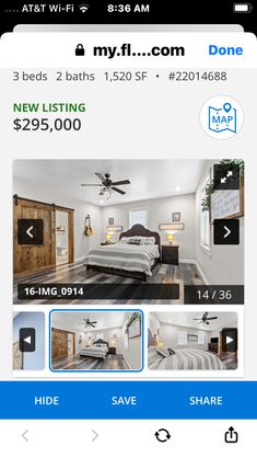 a bed room with two beds and a ceiling fan on the app store's website