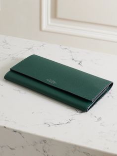 Frequent flyers will love the convenience of Smythson's 'Marshall' wallet. It's crafted from textured-leather with dedicated compartments for your tickets, passport, boarding pass and local currency. It'll be a trusty companion for years to come. Elegant Green Bifold Wallet, Elegant Green Wallets For Travel, Elegant Green Wallet For Formal Occasions, Green Elegant Formal Wallets, Elegant Green Formal Wallet, Classic Saffiano Leather Travel Wallet, Porter Bag, Leather Passport Wallet, Summer Style Guide