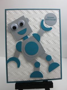 a birthday card with a robot on it