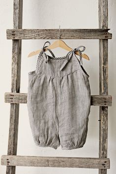 Romper is made of 100% soft medium weight linen. Details: - Composition: 100% Oeko-Tex certified linen - Colour: Grey gingham - Adjustable sleeves with ribbons - Medium weight linen - Linen care: machine wash gentle; tumble dry low, ironing optional - The price is for one romper, other pictured items are not included Linen Kids Clothes, Linen Nursery, Linen Baby Clothes, Overall Linen, Kids Rompers, Jumpsuit Linen, Grey Gingham, Baby Frock Pattern