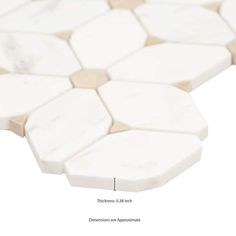 an image of a white and brown tile pattern with measurements for the different areas in it