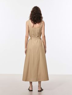 MO&Co. Women's Long Line Cargo Dress Feel stylish and comfortable in our maxi dress. Made from soft cotton fabric, its flowy silhouette and non-adjustable straps provide a flattering fit. With snap multiple cargo pockets and comes with a belt, it's practical and versatile. This style of dress is comfortable and casual, making it a great option for everyday wear or travel. Features : - Long line flowy silhouette- Non-adjustable straps, snap button closure- Multiple cargo pockets, belt included Co Everyday Wear, New Dress, Cotton Fabric, Fashion Dresses, Maxi Dress, How To Wear