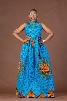 *Ankara  sleeveless maxi dress with back zipper, two side pockets and a self tie belt. * This stunning dress is suitable for every occasion. * This item is handmade with high quality 100% cotton african ankara fabric and ships within a week. *Rush service also available, if you need the item by a particular day, please send me an etsy conversation. A copy of our size chat has  been added to photo collage, please check your size before placing your order, as we will not be responsible for incorre A Shape Gown Ankara, Gathers Dress, Chitenge Dresses, African Formal Dress, Ankara Maxi Dress, Dress African Print, Ankara Dress Designs, African Prom Dresses, Ankara Gown Styles