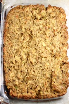 a casserole dish with meat and vegetables in it, ready to be eaten