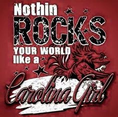 a red t - shirt with the words nothing rocks your world like a cardinal girl