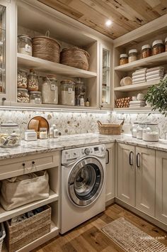 a washer and dryer in a small kitchen