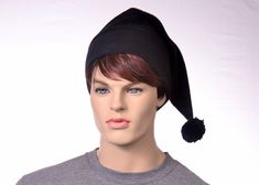 Black Stocking Cap. Black Elf Hat. Long Pointed Black Beanie Hat. Traditional black stocking cap style beanie with pompom , measure about 19 inches long. Double thick headband. This is a warm winter hat made for everyday use but can be used as a costume piece. Ready to ship. One size fits most fitting 22 - 24 inch head. More stocking caps can be found here https://www.etsy.com/shop/MountainGoth?section_id=7201253 MG001190-P Black Costume Accessories For Winter Cosplay, Black Costume Accessories For Cosplay In Winter, Black Hat For Cosplay, Black Beanie For Halloween, Black Hat For Cosplay, One Size Fits Most, Black Cosplay Hat, One Size Fits Most, Adjustable Black Costume Accessories For Winter, Black Adjustable Costume Accessories, Black Cosplay Hat One Size Fits Most