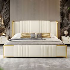 a modern bedroom with gold accents and white bedding, along with two nightstands