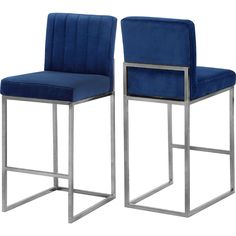 pair of blue velvet bar stools with stainless steel frame legs and footrests