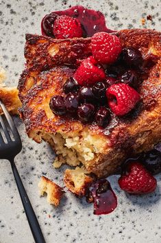 a piece of french toast with berries on top