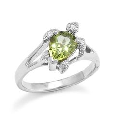 A 14K white gold ring One faceted pear-shaped Peridot stone, 8x6mm "Turtle" Design, approximate size of turtle 10mm Available in ring sizes (5 to 9) Contact us for additional ring sizes Sea Turtle Jewelry, Rose Gold Ring Set, Turtle Ring, Bijoux Art Nouveau, Hawaiian Jewelry, Peridot Stone, Mode Inspo