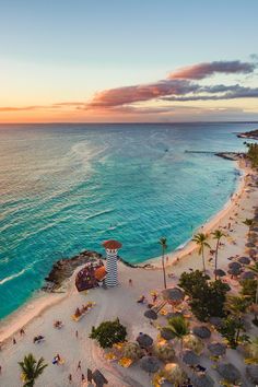 an aerial view of the beach and ocean at sunset in canculla, mexico