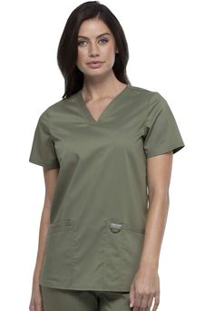 PRICES MAY VARY. FLATTERING FIT, SIZES UP TO 5XL - Workwear Revolution womens scrubs have the sizes you want and the features you need. Available in sizes from XXS to 5XL. This Modern Classic fit v-neck scrub top is designed for comfort and maximum durability. Center back length (size S) is 27”. (Scrub pants sold separately.) V-NECK STYLING - This comfortable v-neck medical uniforms & scrubs top offers healthcare workers a uniform that is professional, hardworking and stylish while being afforda Scrubs For Women, Fit Scrubs, Green Scrubs, Womens Scrub Tops, Cherokee Woman, Safety Clothing, Healthcare Workers, Medical Uniforms, Womens Scrubs