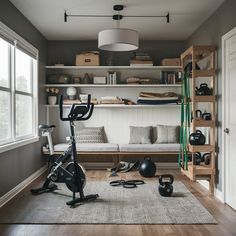 a home gym with exercise equipment and bookshelves