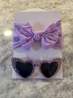 A gift set created with our original sparkle specs with the addition of an ultra soft and stretchable bow! Sunglasses are made with high quality glass rhinestones and industrial adhesive for maximum bling and durability. Purple glass rhinestones with an aurora borealis shine.  Please message me if you would like to mix and match any of the glasses and bows and I will do my best accommodate. Heart Sunglasses, Purple Rhinestone, Bow Set, Purple Glass, Aurora Borealis, Eyewear Sunglasses, Girl Gifts, Festival Season