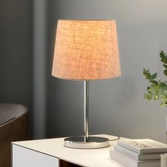 Tan linen lamp shade offers a rustic, natural look. Recommended for small bases, less than 18-in tall. Base sold separately, so you can complement a weathered wood base or add contrasting texture to a sleek, black base. allen + roth 7-in x 10-in Tan Linen Fabric Drum Lamp Shade in Brown | 616188 Linen Lamp Shade, Linen Lamp, Linen Lamp Shades, Drum Lamp Shade, Drum Lamp, Allen Roth, Drum Lampshade, Weathered Wood, World Market