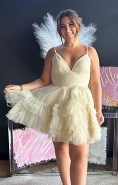 Wedding Fit And Flare Mini Dress With Ruffles, Flirty Mini Dress With Ruffled Straps For Wedding, A-line Ruffled Mini Dress For Prom, A-line Mini Dress With Ruffles For Prom, V-neck Ruffled Mini Dress For Prom, Tiered Ruffle Mini Dress For Homecoming, Elegant Tiered Mini Dress For Homecoming, Cocktail Dress With Ruffle Hem And Spaghetti Straps, Cocktail Dress With Spaghetti Straps And Ruffle Hem