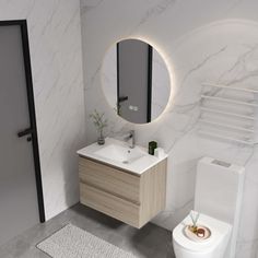 a bathroom with a toilet, sink and mirror