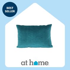 a blue pillow with the words best seller at home on it and an image of a house