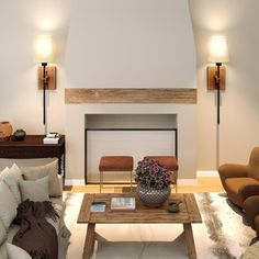 a living room with two couches and a table in front of a fire place