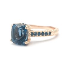 It is an heirloom quality engagement ring that is sure to become a precious family heirloom. This is a limited edition Alpha Jewelry original. Order now to guarantee availability. Follow our etsy shop become our members can get new tips on products on time and also get 10% off on new products. https://www.etsy.com/shop/AlphaJewelryCompany Luxury Blue Topaz Ring With Rose Cut Diamonds, Heirloom Blue Sapphire Promise Ring, Blue Rings With Rose Cut Diamonds For Promise, Blue Rose Cut Diamond Promise Ring, Blue Sapphire Ring With Rose Cut Diamonds For Anniversary, Blue Topaz Ring With Rose Cut Diamonds, Anniversary Blue Sapphire Ring With Rose Cut Diamonds, Blue Cushion Cut Topaz Promise Ring, Anniversary Cushion Cut Blue Topaz Ring