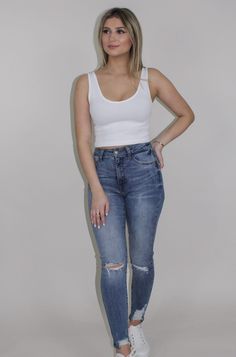 This is the perfect ribbed tank! Wear it with your fav sweats for a casual look or pair it with a cute skirt for a night out! Super stretchy material! Heres the tea... Ribbed knit V Neckline Crop top 92% Nylon, 8% Spandex One Size Fit Model is 5ft4 Wearing a size SMALL