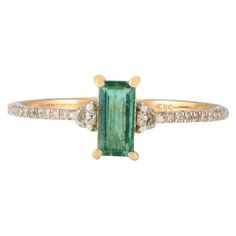 Minimalist Emerald Diamond Everyday Ring Set in 14K Gold featuring natural emerald of 0.35 carats and diamonds of 0.12 carats. The gorgeous handcrafted ring goes with every style. Emerald enhances intellectual capacity of the person. Designed with baguette cut emerald set in center with diamonds flanked on both sides that makes it a perfect fit to wear it on your wedding or style it with any of your basic outfit to give it a glam. This is a perfect May Birthstone Jewelry also perfect Bridal Show Perfect Bridal Shower Gift, Gemstone Solitaire Ring, Emerald Set, Sapphire Solitaire Ring, Mother Daughter Gifts, Gold Solitaire Ring, Sapphire Solitaire, Everyday Ring, Gold Gemstone Ring