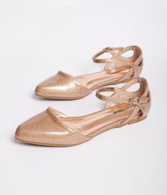 Sparkle and shine, dears! These sweet flats from Unique Vintage are crafted in a fabulous flexible vinyl that shimmer with champagne glitter throughout. The Libby Flats feature a dÕOrsay cut with an adjustable ankle strap while the cushion insole keeps you comfortable all day! Available while supplies last Party Synthetic Ballet Flats, Party Ballet Flats In Synthetic Material, Metallic Flats For Spring Party, Gold Pointed Toe Ballet Flats For Party, Gold Low Heel Flats For Party, Summer Party Synthetic Ballet Flats, Synthetic Closed Toe Ballet Flats For Parties, Gold Flats With Round Toe For Party, Gold Round Toe Flats For Party