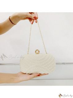 Bird in Bag - Exquisite Handcrafted Vintage Pearl Clutch Bag with Box Shape Design, Elegantly Adorned with Pearls and Artificial Diamonds, Featuring Glossy Faux Pearls - Ideal for Retro Style Soirees, Weddings, Banquets, Galas, and Celebratory Events. Versatile Design allows for Handheld, Crossbody, and Shoulder Wearing Options. Beige Pearl Embellished Evening Bag For Wedding, Elegant Pearl White Party Clutch, Elegant Pearl Wedding Bags, Beige Pearl Evening Bag For Wedding, Elegant White Evening Bag For Wedding, White Elegant Wedding Evening Bag, Elegant White Wedding Evening Bag, Elegant Evening Bag With Pearl Embroidery For Wedding, Pearl White Evening Bag For Wedding