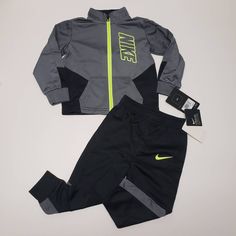 Nike Block Logo Full Zip Tricot 2-Piece Outfit Sz 24m New With Tags Ships From Smoke Free Pet Free Home #Nike #Outfit #Sport #Joggers #Nwt #Ohbaby Gray Sportswear Set For Sports, Nike Sporty Winter Sets, Sporty Nike Winter Sets, Fitted Gray Sporty Sets, Sporty Fitted Gray Set, Gray Long Sleeve Playwear Sets, Nike Sporty Sports Sets, Sporty Black Sets For Spring, Nike Long Sleeve Sports Sets