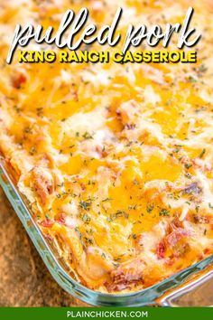 a casserole dish with cheese and meat in it on a wooden table top