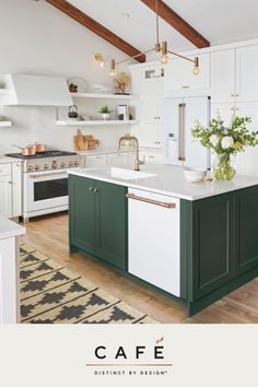 a kitchen with green cabinets and white appliances