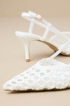 The Billini Davine White Woven Pointed-Toe Slingback Pump will be your go-to for looking effortlessly stylish any day of the week! These faux leather heels feature a woven construction (with trendy pierced details throughout) that shapes a pointed-toe upper with a low-cut collar, supportive side straps, and a slender slingback strap with an adjustable gold buckle. A stunning stiletto heel completes the sleek design! Available in whole sizes only. 2. 75" wrapped stiletto heel. Lightly cushioned i Faux Leather Heels, Day Of The Week, Slingback Pump, Stiletto Heel, Low Cut, Leather Heels, Sleek Design, Stiletto Heels, Rubber Sole