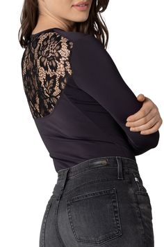 Sleek and sultry. This lace long sleeve crew neck bodysuit is made from delicate lace and a stretch, nylon blend fabric that accentuates. Product Features: Full Cut Bottom Lace Back Snap Closure Gusset For Ease Nylon, Spandex Second-Skin Like Fabric Model is 5'10 and wearing size Medium Materials and Care: 80% Nylon / 20% Spandex Machine-Wash Cold Gentle Imported For hygiene purposes, all bodysuits are final sale. Lace Stretch Bodysuit For Night Out, Stretch Lace Bodysuit For Night Out, Black Stretch Lace Bodysuit, Fitted Long Sleeve Lace Bodysuit, Stretch Lace Long Sleeve Bodysuit, Elegant Long Sleeve Lace Bodysuit, Stretch Long Sleeve Lace Top For Night Out, Stretch Lace Long Sleeve Top For Night Out, Stretch Lace Top With Long Sleeves For Night Out