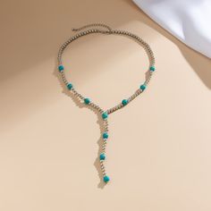 Material: Plastic/Resin Color: White K 5640 Fashion Element: Round Style: Europe and America Turquoise Lariat Beaded Necklaces, Turquoise Beaded Chain Necklace For Summer, Turquoise Lariat Beaded Necklace With Colorful Beads, Turquoise Beads For Jewelry Making In Summer, Turquoise Jewelry With Colorful Metal Beads, Turquoise Beaded Long Necklace With Dangling Beads, Turquoise Lariat Beaded Necklace, Turquoise Beaded Chain Necklace With Dangle, Blue Beaded Turquoise Lariat Necklace