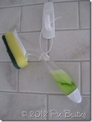 an image of a toothbrush and soap being used to clean the bathroom tile wall