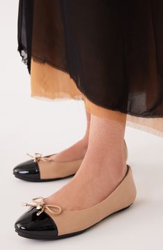 A gleaming charm details the delicate bow on a poised ballet flat fashioned with a cap toe for contemporary appeal. Cushioned footbed Synthetic upper and lining/rubber sole Imported Womens Ballet Flats, A Cap, Ballet Flat, Fashion Flats, Anne Klein, Ballet Flats, Rubber Sole, Ballet, Nordstrom