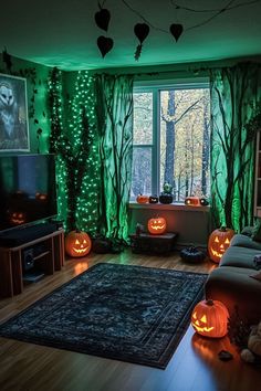 a living room decorated for halloween with pumpkins on the floor and lights in the windows