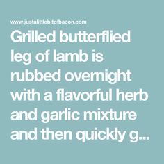 the words grilled butterflied leg of lamp is rubber overnight with a flavored herb and garlic mixture and then quickly g