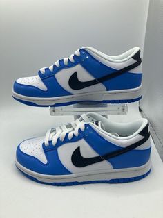 Nike Dunk Low Photo Blue White Black FV7021-400 (GS) Size 6.5Y. Condition is New with box. Shipped with USPS Priority Mail. Black Tick, Sneaker Ball, Blue White And Black, Blue Sneakers, Nike Dunk Low, Dunk Low, Nike Dunk, Nike Dunks, Priority Mail