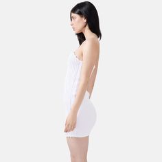 Introducing the Mycel Rib Knit Mini Dress in White—a true blend of elegance and edge. Handcrafted pleating enhances a curvaceous fit, making this dress both flattering and playful. Perfect for special occasions or when you want to make an unforgettable entrance, its luxe heavyweight rib knit offers warmth, breathability, and a beautifully structured drape. Sustainably made in Australia, this standout piece is designed for women who value timeless style with a touch of daring charm Slip on 80% Ac Elegant Ribbed Summer Dress, Elegant Ribbed Mini Length Dress, White Fitted Ribbed Mini Dress, Fitted Ribbed Dress For Date Night, Ribbed Fitted Evening Dress, Fitted Ribbed Evening Dress, Fitted Pleated Dress For Date Night, April Birthstone Jewelry, March Birthstone Jewelry