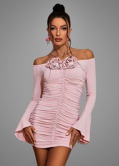 This off-shoulder bodycon dress features trumpet sleeves and delicate floral applique for a sophisticated touch. The ruched design adds texture and a flattering fit to this mini dress, perfect for any occasion. Available in a pretty pink hue. Fabric: Medium Stretch Material: Polyester, Elastane Ruched Mini Off-shoulder Dress, Feminine Fitted Ruched Off Shoulder Dress, Elegant Ruched Off Shoulder Mini Dress, Feminine Fitted Off Shoulder Dress With Ruched Details, Elegant Off Shoulder Ruched Mini Dress, Elegant Ruched Off-shoulder Mini Dress, Feminine Off-shoulder Fitted Bodycon Dress, Elegant Ruched Off Shoulder Bodycon Dress, Elegant Ruched Bodycon Off Shoulder Dress